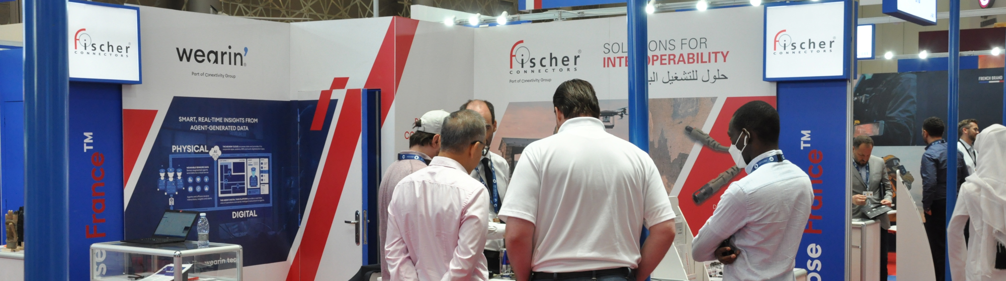 Visitors on the Fischer Connectors' stand at Milipol Qatar