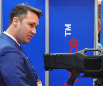 Visitors on the MC2 Technologies' stand at Milipol Qatar