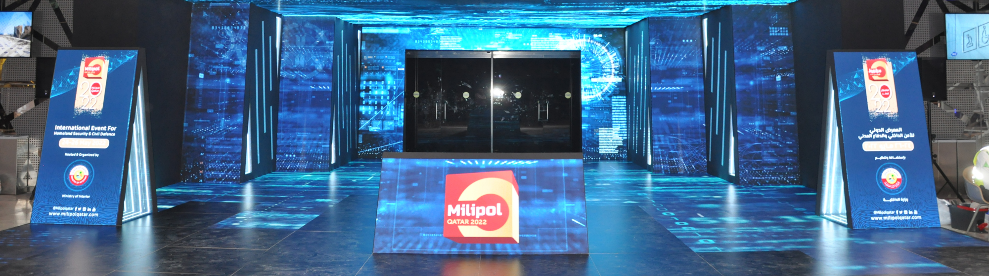Milipol Qatar event entrance with light show and logo