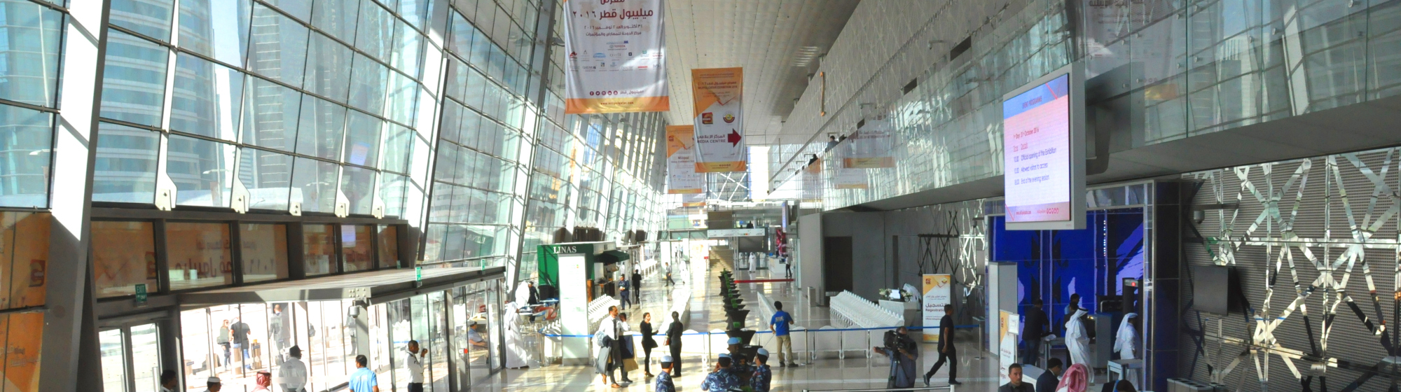 Milipol Qatar entrance with a view of Doha's buildings