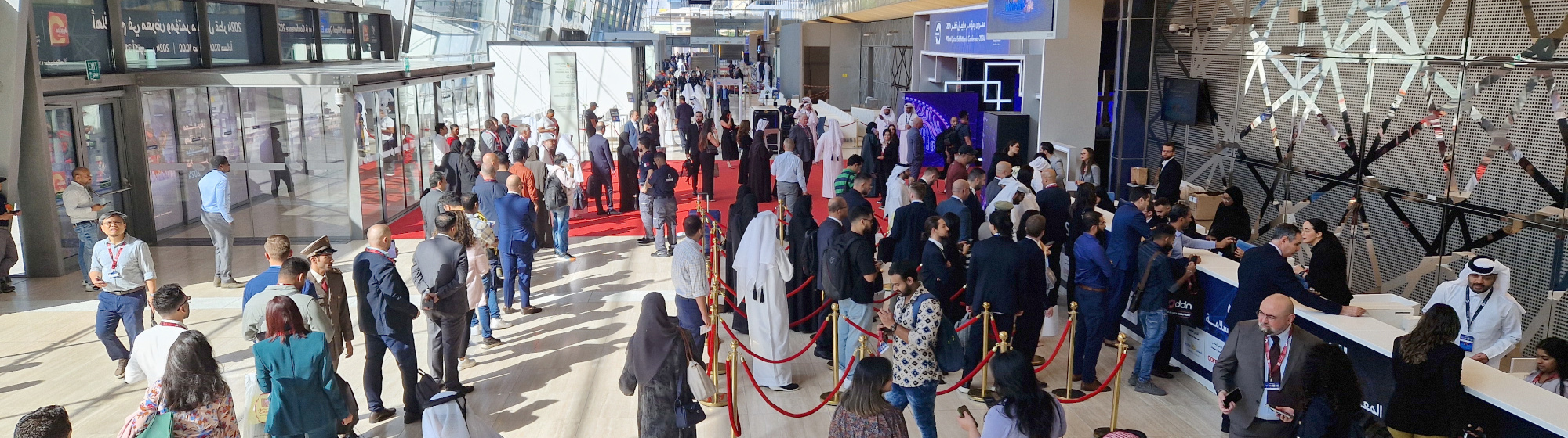 Entrance of Milipol Qatar with plenty of visitors