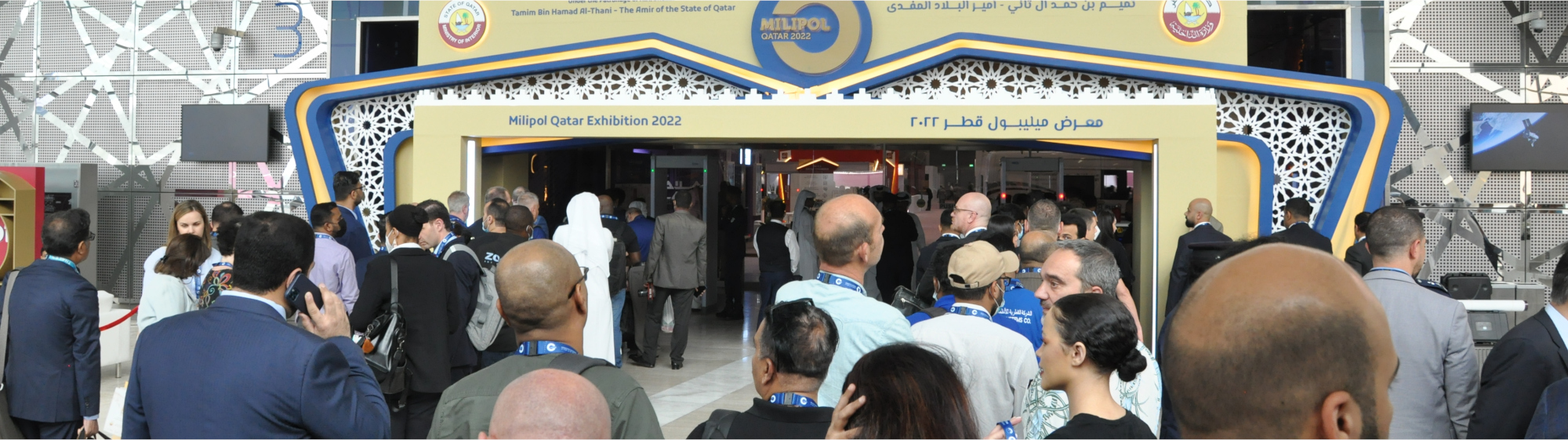 Entrance of Milipol Qatar with plenty of visitors