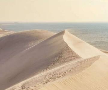 View of Khor Al Adaid, the inlan sea in Qatar from sand dunes